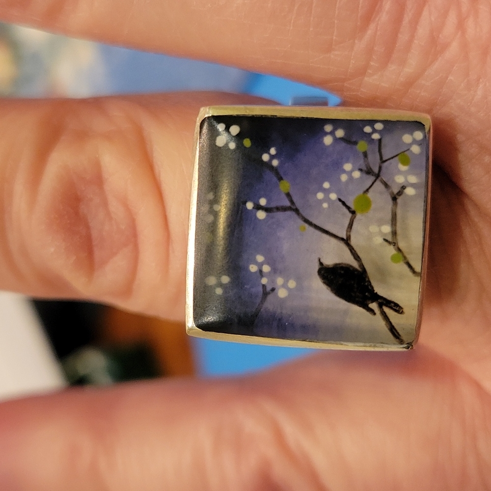 Acrylic ring with bird